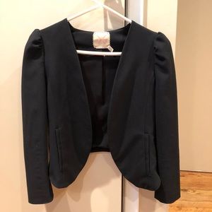 Adorable black blazer with a girly and edgy flair